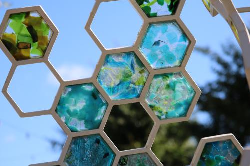 Close up of blue and green glass sculpture