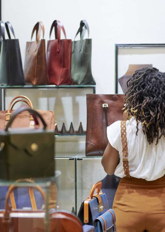 Shopper in a boutique handbag shop